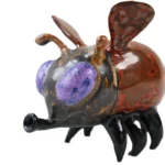 Front view of rust glaze handmade ceramic bee ornament, hand-thrown pottery insect figurine for shelf & table home decor