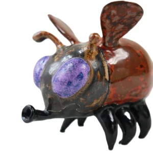 Front view of rust glaze handmade ceramic bee ornament, hand-thrown pottery insect figurine for shelf & table home decor